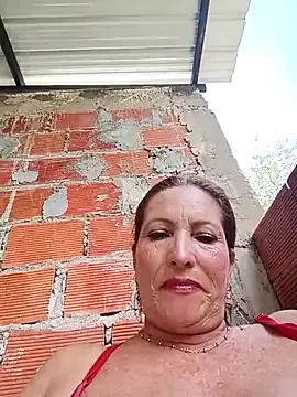 Sexy-Woman-Mature — squirt fountain in the garden